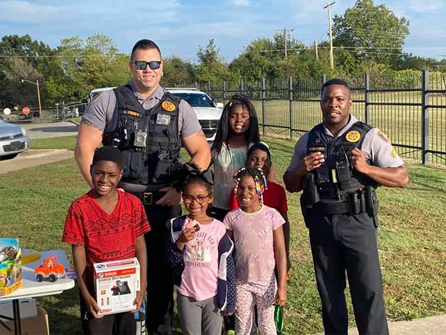 Tulsa County Deputies Interacting with Kids in the Community.